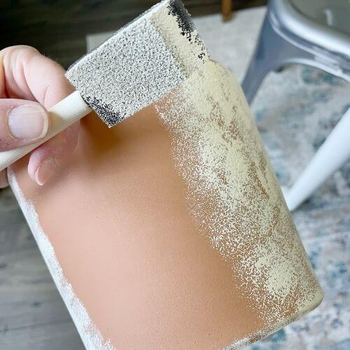 Painting terra cotta pot with sponge brush