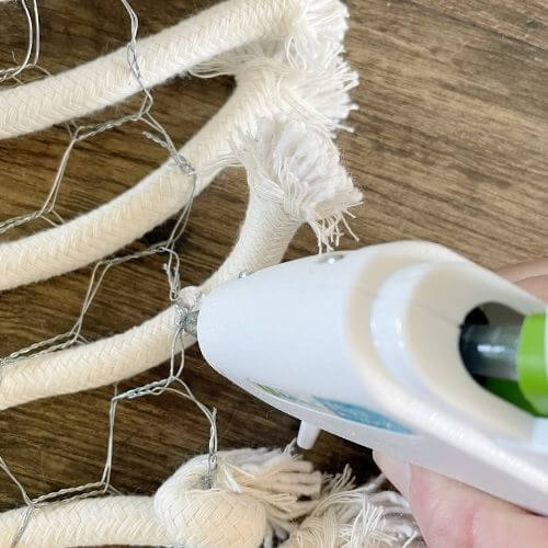 Use glue gun to secure ends