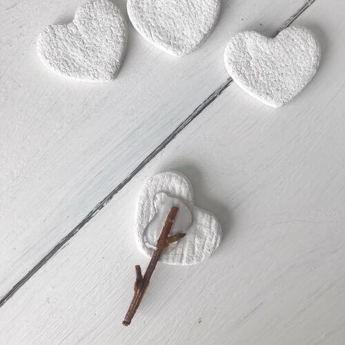 White dough hearts glued to stems