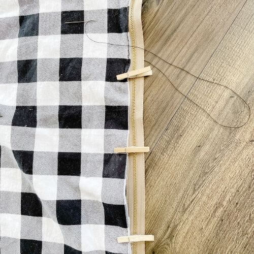 Use clothespins to fold back fabric, then sew zipper