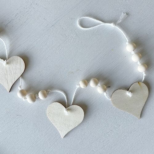 Finished wood heart and bead garland
