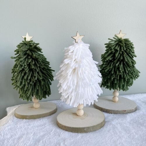 Green and white yarn trees