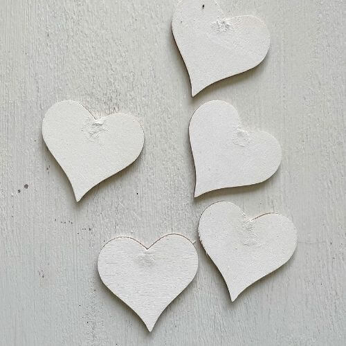 Five spackled wood hearts for wreath
