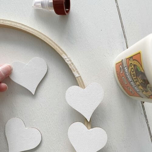 Wood glue on hoop for securing heart