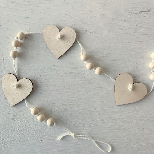 Natural wood heart with cotton string garland