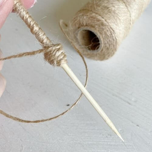 Once you reach good stem length wrap twine around forming ball