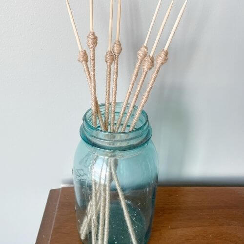 Finished jute twine stems in antique jar