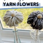 Yarn flowers on windowsill