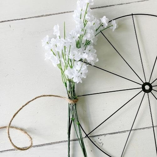 Secure second bunch of baby's breath to wreath form