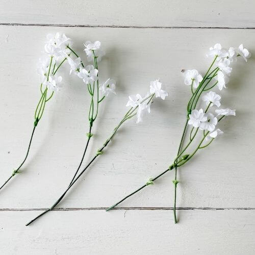 Clip floral stem into 4 branches