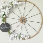 Bike wheel wreath made from Dollar Tree Supplies