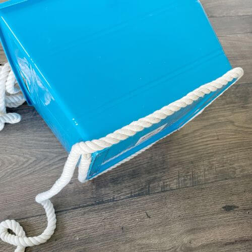 Line bottom of bin with rope using hot glue