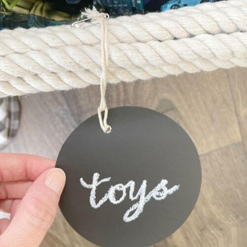 Hang chalkboard tag on basket using safety pin or glue