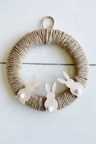 Finished jute wire wreath with 3 wood bunnies. 