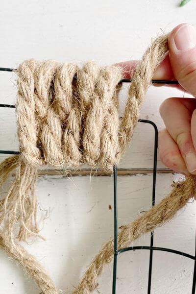 Continue weaving jute rope until you get to the corner.