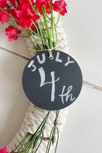 Then tie the chalkboard tag onto the middle portion of your wreath. 