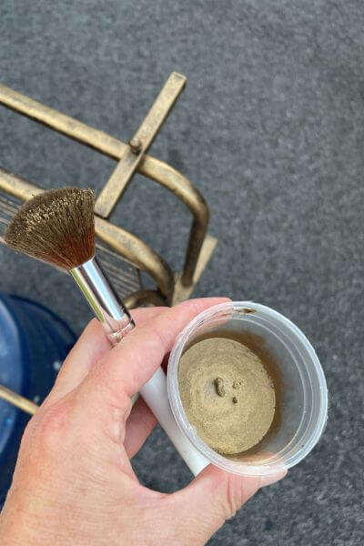 Use make-up brush to apply Rub 'n Buff to the shelf once the paint dries.