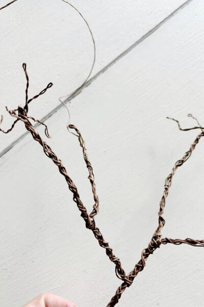 Widen the smaller limb by adding strands of wire. 