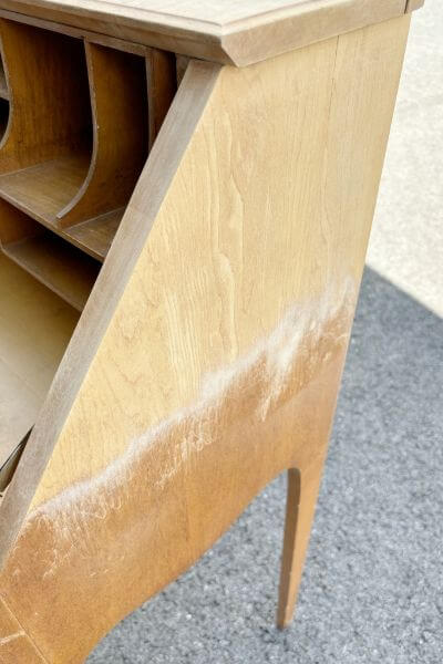 Side of desk half sanded with 60 grit sandpaper.
