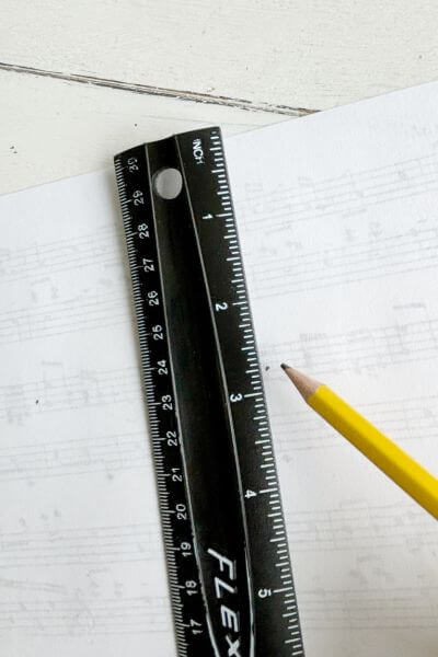 Measuring the back of the music page printable to make 4 equal pieces. 