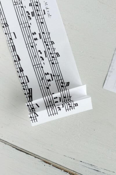 Music notes paper folded accordion style,