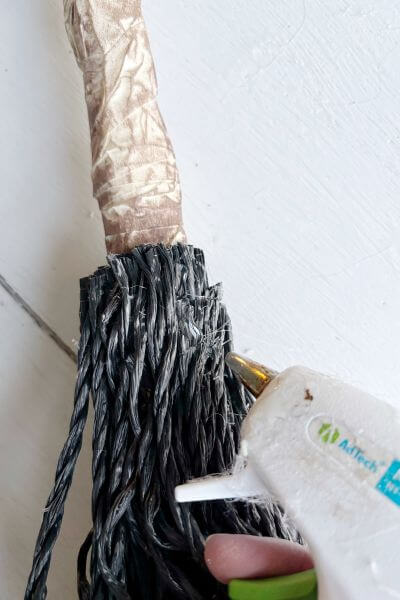 Third layer of poly rope glued to broom handle. 