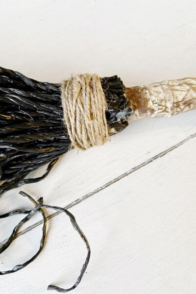 Twine wrapped around and glued. 