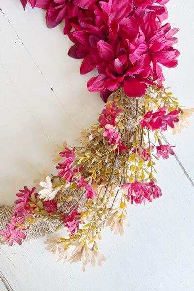 Tuck the wildflowers into the burlap arranging them as you like. 