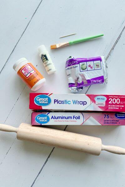 Supplies for air dry clay ghost DIY.