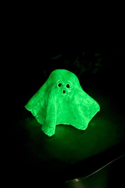 One glow in the dark clay ghost at night. 