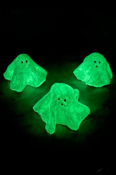Three glow in the dark clay ghosts. 