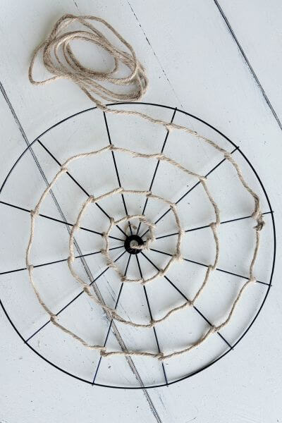 Finish the inside spider web section of this wreath with the second roll of jute wire. 