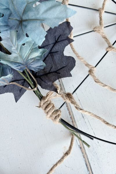 Second set of leaves wrapped with jute cord to stabilize. 