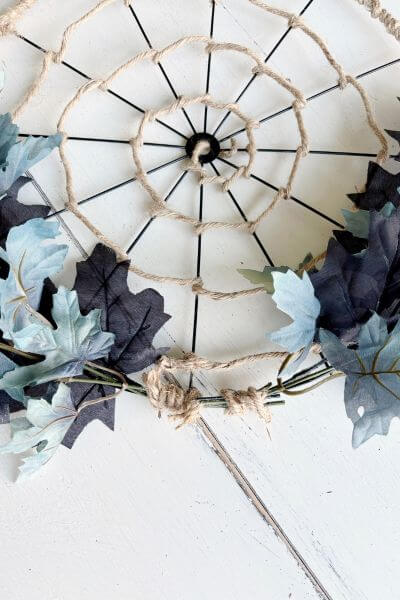 Two sets of leaves added to each side of the spider web wreath. 