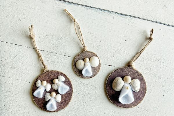 Three rustic angel ornaments using seashells, felt and half wood beads.
