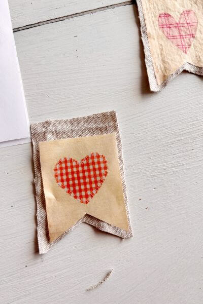 Place the paper printable glue side down onto the drop cloth.