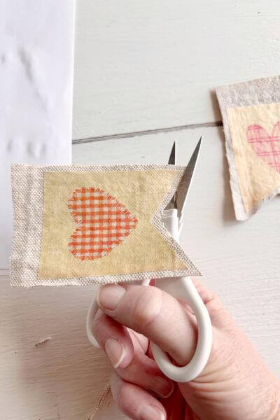 Trim the excess drop cloth off using the scissors.