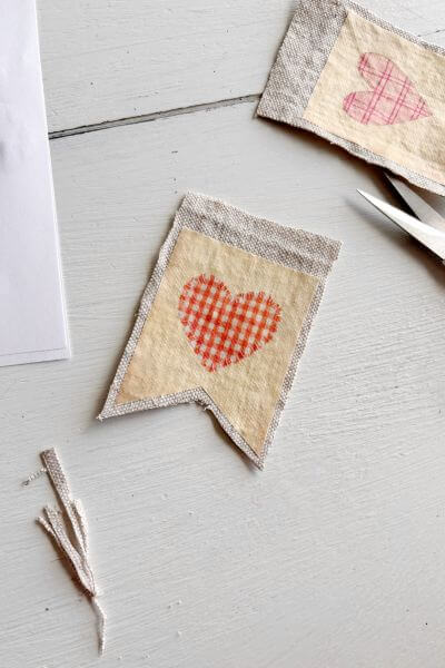 Trim the excess drop cloth around the paper printable.