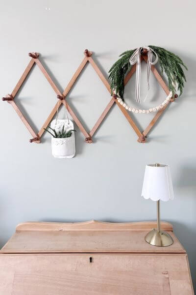 Completed farmhouse evergreen wood bead wreath DIY.