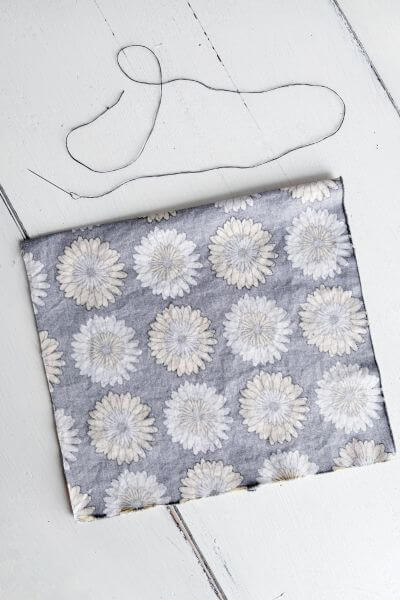 Turn one piece of fabric inside out.