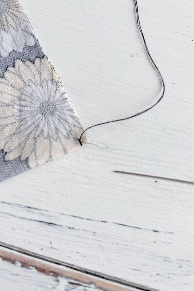 Make an anchor stitch.