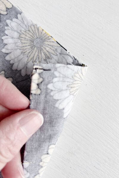 Pull the thread threw to complete the backstitch.