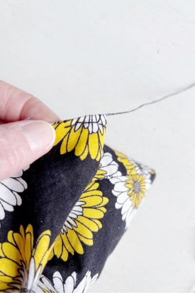 Backstitch across the top of the hot pack.