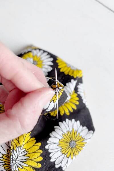 Three loops around the needle.