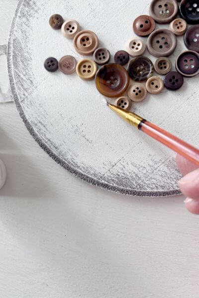 Touch up pencil lines with a little paintbrush and white paint.