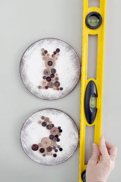 Line up the three wood rounds using a level.