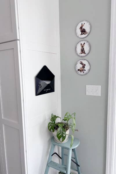 Three wood rounds with brown button bunnies for Spring decor.