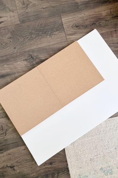 Two cork boards placed at the top corner of the foam board.