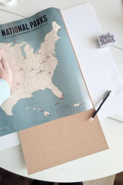 Map placed on cork and foam board and used to measure how much cork board is needed of the third one.