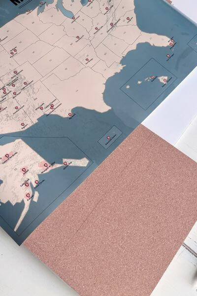 Flip the third cork board around and make another line where the map ends at the left corner.